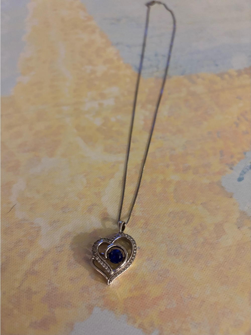 This beautiful sterling silver heart shaped with blue stone that dangles. 22.00 - Picture 6 of 6